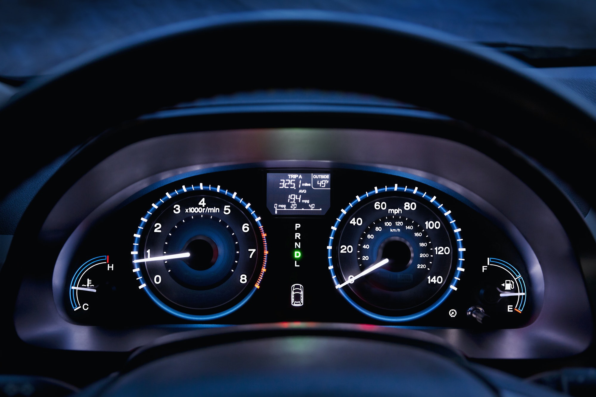 Tachometer, car dashboard,instrument panel,and fuel gauge. A speedometer